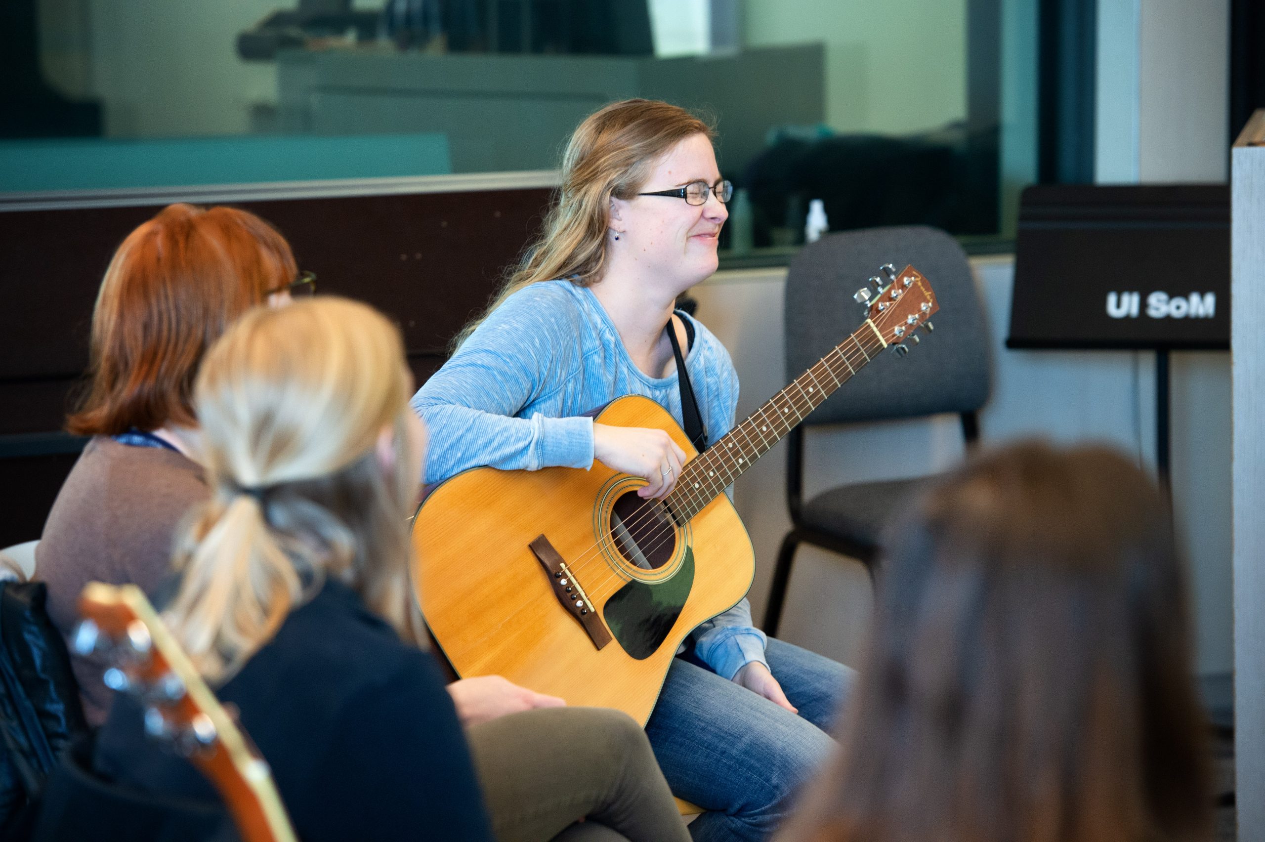 Students developing skills on guitars for use in clinical music therapy sessions.