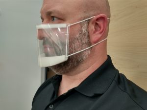 Clear Mask photo, white male wearing mask that is open on the sides.