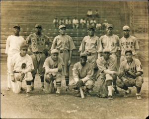 A group of baseball players poses for a picture