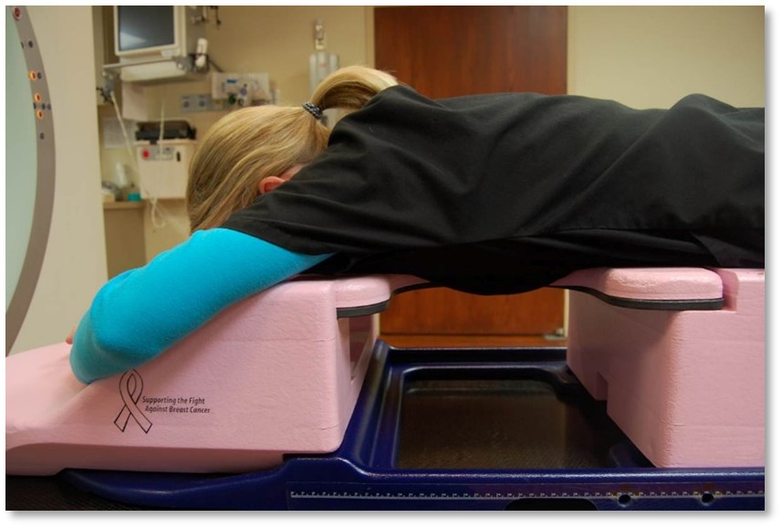 Patient positioned for a prone breast treatment.