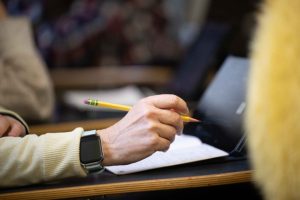 Hand with pencil