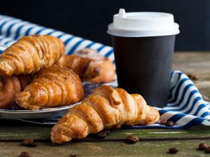 Decorative - a breakfast made of croissants and a coffee